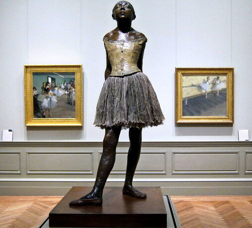 The Little Fourteen-Year-Old Dancer by Edgar Degas in the Metropolitan Museum of Art with two Degas paintings in the background