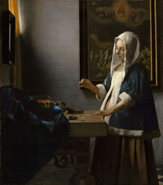 Woman Holding a Balance by Johannes Vermeer in the National Gallery of Art in Washington, DC