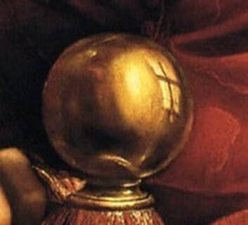 Detail of a golden ball-shaped ornament in the Portrait of Leo X with Two Cardinals by Raphael in the Uffizi Gallery in Florence